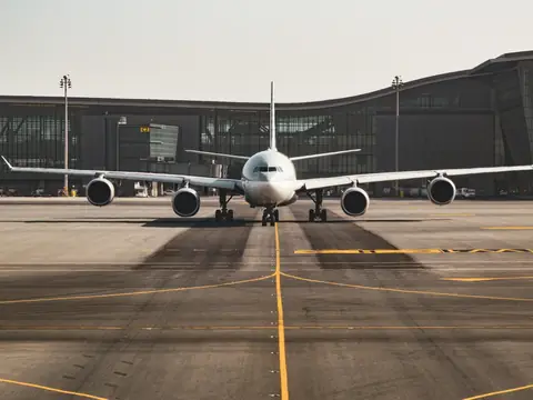 Wide-body aircraft parked on an airport apron